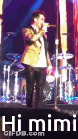 Man Singing Into Microphone Saying Hi Mimi GIF