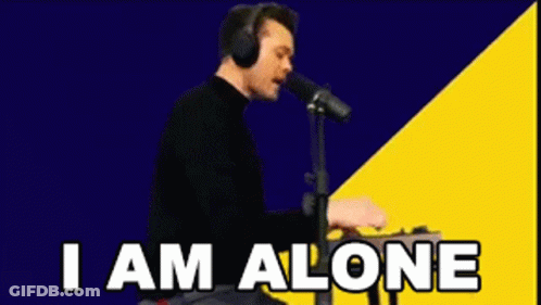 Man Singing Into Microphone Saying I Am Alone GIF