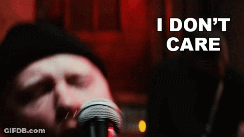 Man Singing Into Microphone Saying I Don't Care GIF
