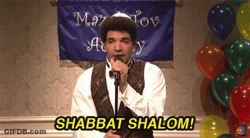 Man Singing Into Microphone Says Shabbat Shalom GIF