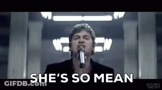 Man Singing Into Microphone She's So Mean GIF