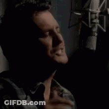 Man Singing Into Microphone So Damn Hot GIF
