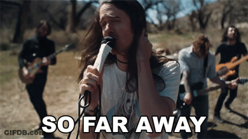 Man Singing Into Microphone So Far Away GIF