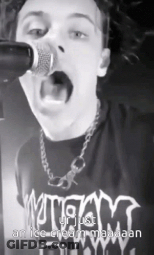 Man Singing Into Microphone GIF