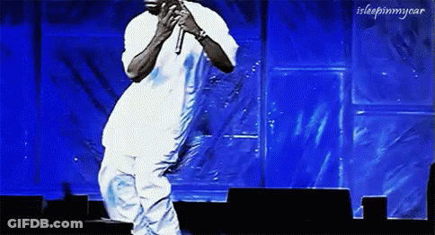 Man Singing Into Microphone GIF
