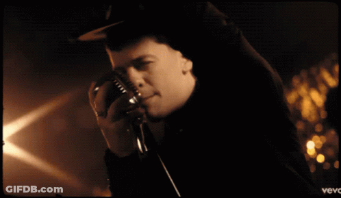 Man Singing Into Microphone Vevo GIF