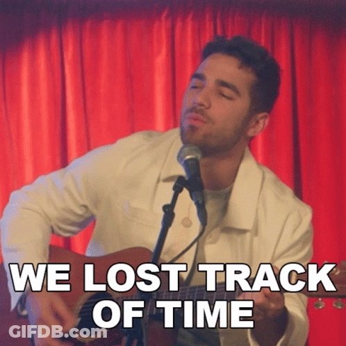 Man Singing Into Microphone We Lost Track Of Time GIF