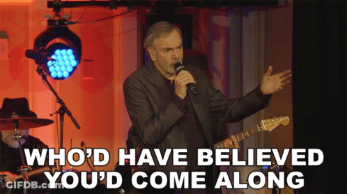 Man Singing Into Microphone Who'd Have Believed You'd Come Along GIF