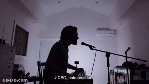 Man Singing Into Microphone With CEO Entrepreneur GIF