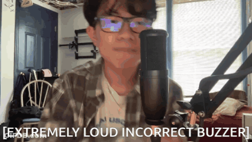 Man Singing Into Microphone With Extremely Loud Incorrect Buzzer GIF