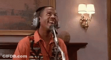 Man Singing Into Microphone With Headphones GIF