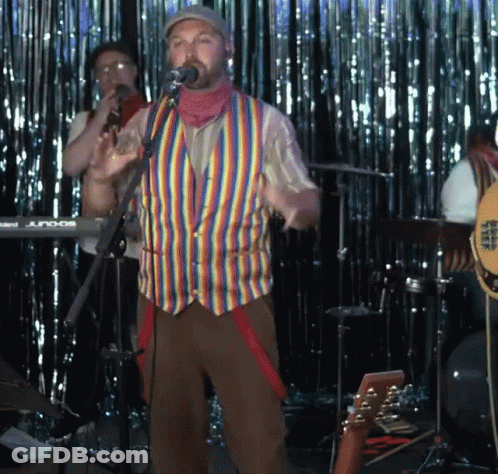 Man Singing Into Microphone With Juno Keyboard GIF