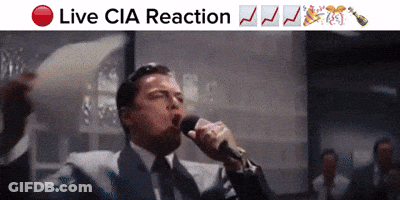 Man Singing Into Microphone With Live CIA Reaction Sign GIF