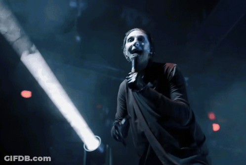 Man Singing Into Microphone With Red Light GIF