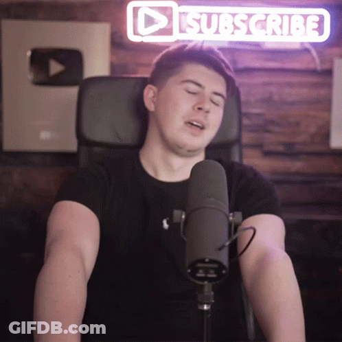 Man Singing Into Microphone With Subscribe Sign GIF