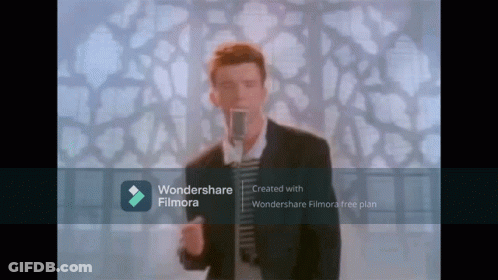 Man Singing Into Microphone With Wondershare Filmora Logo GIF