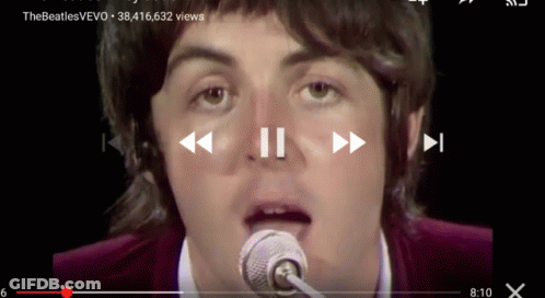 Man Singing Into Microphone Woman Playing Piano GIF
