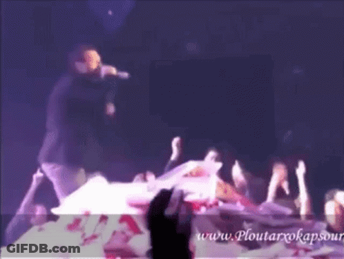 Man Singing Into Microphone GIF