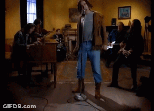Man Singing Into Microphone GIF
