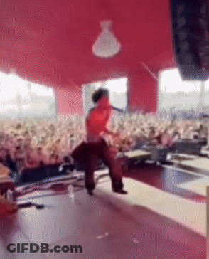 Man Singing Into Microphone GIF