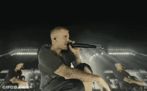 Man Singing Into Microphone GIF