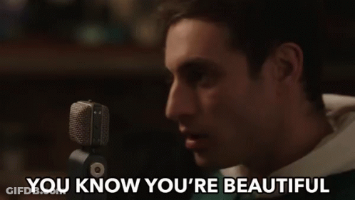 Man Singing Into Microphone You Know You're Beautiful GIF