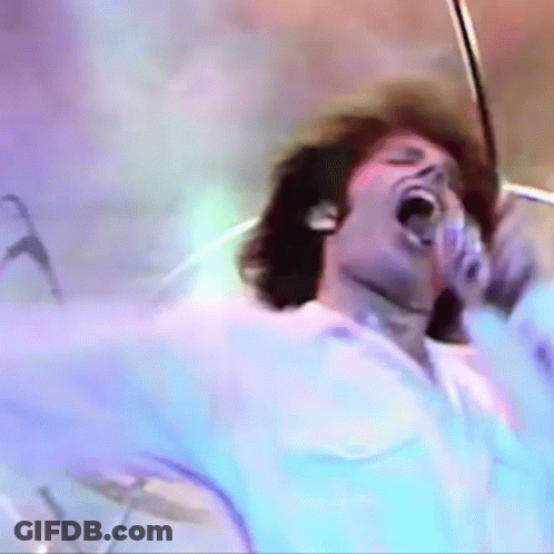 Man Singing Into Microphone GIF