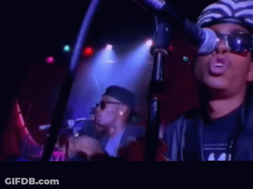 Man Singing Into Microphone GIF