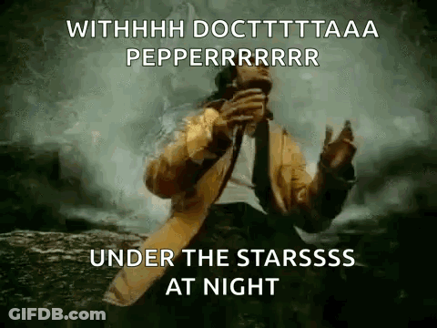 Man Singing Under The Starss At Night GIF