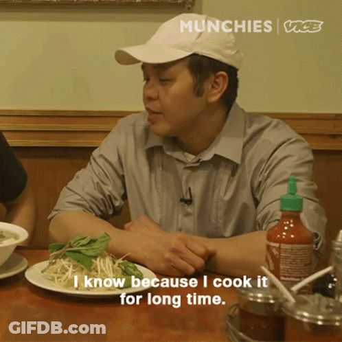 Man Sits At Table With Food Says I Know Because I Cook It For Long Time GIF