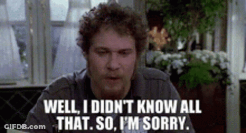 Man Sitting At A Table Saying Well I Didn't Know All That So I'm Sorry GIF