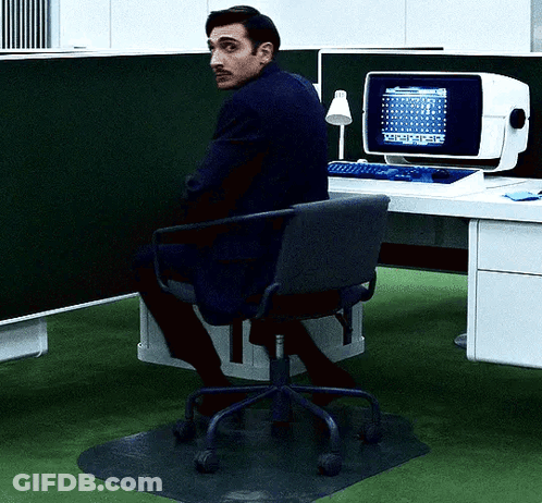 Man Sitting At Computer With ABC Screen GIF