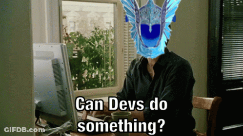 Man Sitting At Computer With Blue Mask Saying Can Devs Do Something GIF
