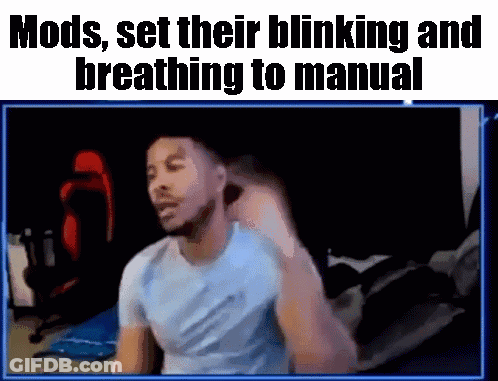 Man Sitting At Computer With Mods Set Their Blinking And Breathing To Manual GIF