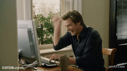 Man Sitting At Computer With Pmitf.com GIF