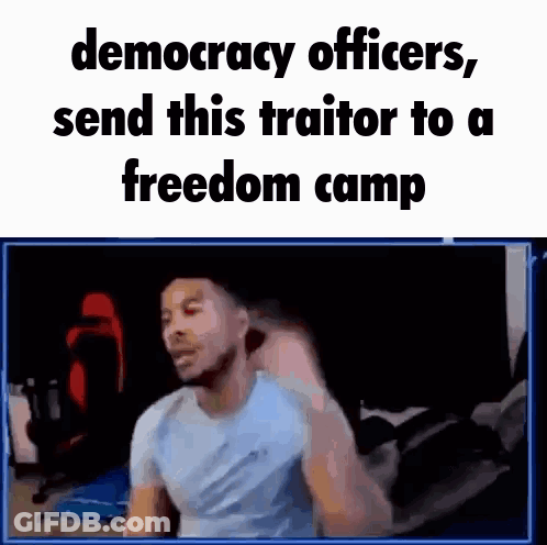 Man Sitting At Computer With Text Democracy Officers Send This Traitor To A Freedom Camp GIF