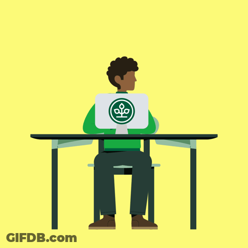 Man Sitting At Desk Holding Laptop With Green Logo GIF