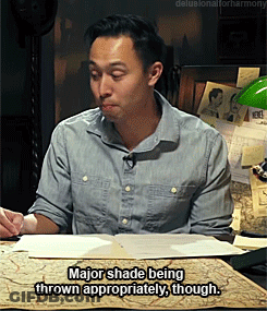 Man Sitting At Desk Saying Major Shade GIF