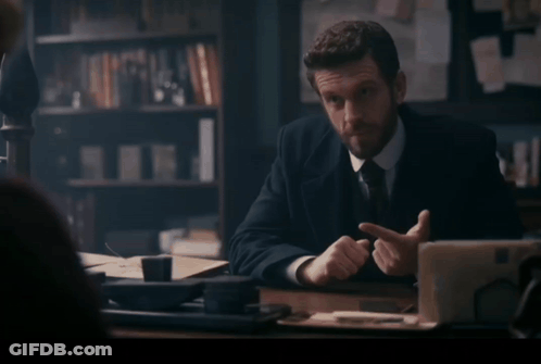 Man Sitting At Desk Saying Possibly GIF