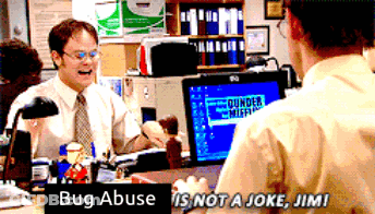 Man Sitting At Desk With Bug Abuse Sign GIF
