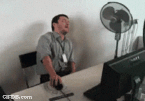 Man Sitting At Desk With Dell Computer Monitor GIF
