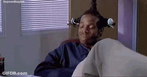 Man Sitting At Desk With Eyes Closed GIF