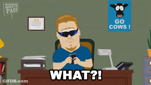 Man Sitting At Desk With Go Cows Poster GIF
