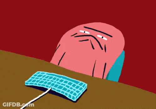 Man Sitting At Desk With Keyboard GIF