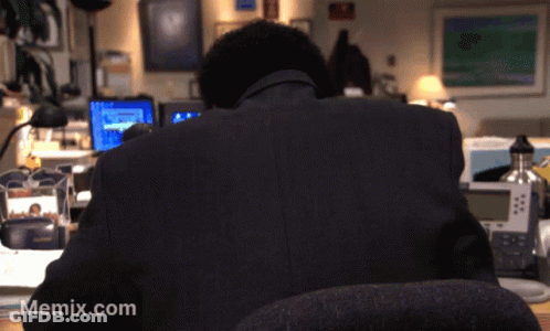 Man Sitting At Desk With Memix.com GIF