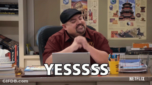 Man Sitting At Desk With Netflix Sign GIF
