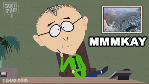 Man Sitting At Desk With South Park Sign GIF