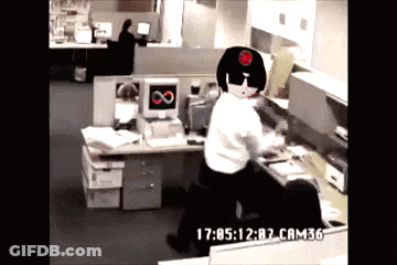Man Sitting At Desk With Time 17:05:12 GIF
