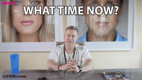 Man Sitting At Desk With What Time Now GIF