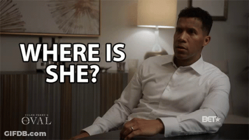 Man Sitting At Desk With Where Is She GIF